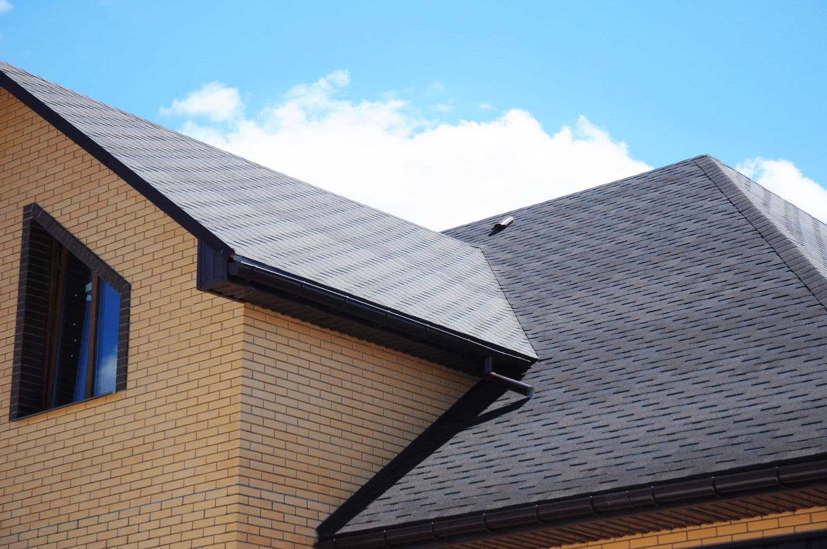 Asphalt shingles house roofing construction, repair.