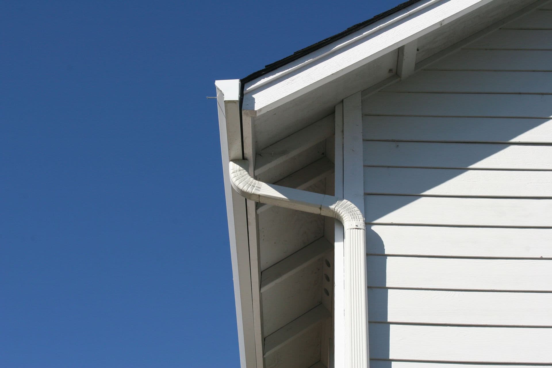 Rain Gutters On a House.
