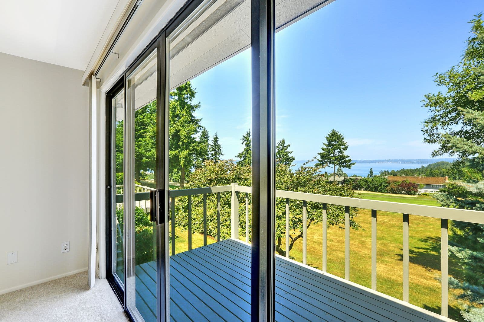 Walkout Deck With Glass Sliding Doors.